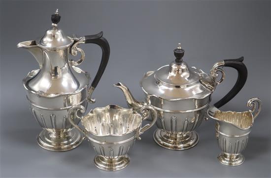 A late Victorian fluted four piece silver tea set, Sheffield 1893 (teapot marks rubbed and possibly later) Gross 39oz.